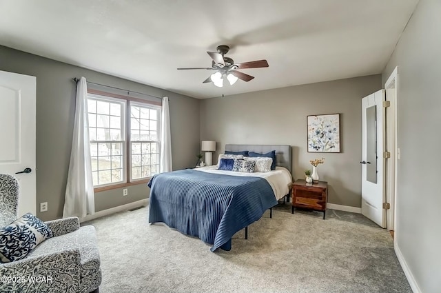 carpeted bedroom featuring visible vents, ceiling fan, and baseboards