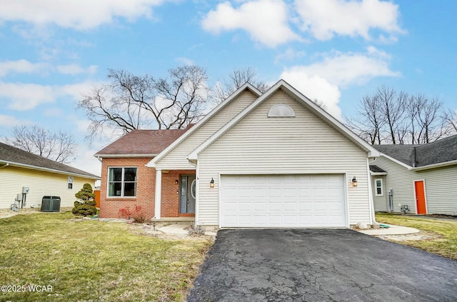 ranch-style home featuring aphalt driveway, cooling unit, a garage, brick siding, and a front lawn