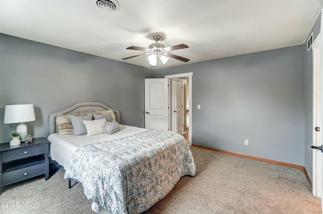 bedroom with light colored carpet, visible vents, ceiling fan, and baseboards