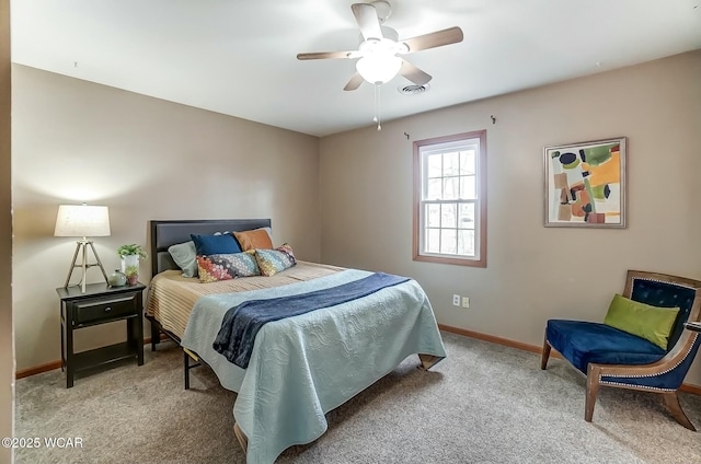 bedroom with carpet floors, baseboards, visible vents, and ceiling fan