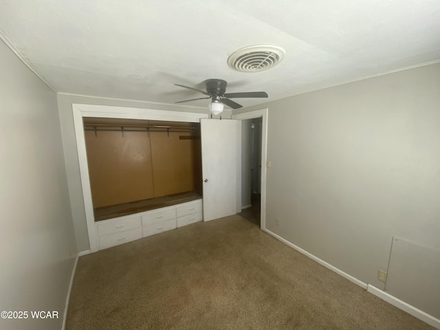 7110 State Route 66, Fort Loramie, OH 45845 - unfurnished bedroom featuring carpet, a closet, and ceiling fan