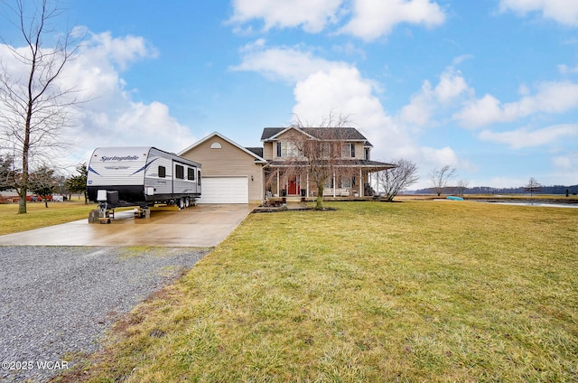 view of front of property featuring a garage, a porch, and a front yard