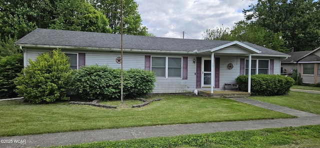 209 Wagner St, Alger, OH 45812 - ranch-style house featuring a front yard and roof with shingles