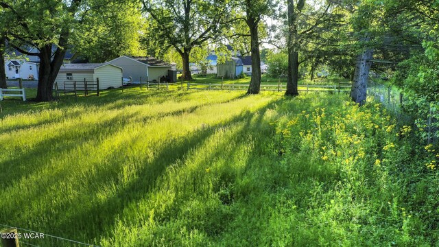 247 W State St, West Mansfield, OH 43358 - view of yard with a residential view