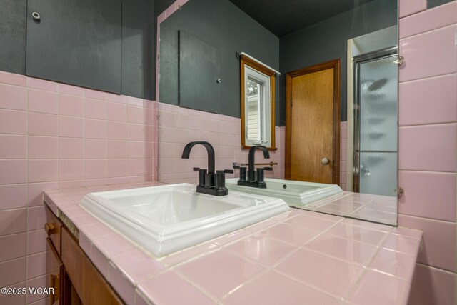 247 W State St, West Mansfield, OH 43358 - full bathroom with tile walls, vanity, and a shower stall