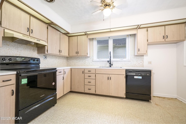 247 W State St, West Mansfield, OH 43358 - kitchen featuring black appliances, under cabinet range hood, a sink, light brown cabinetry, and light countertops