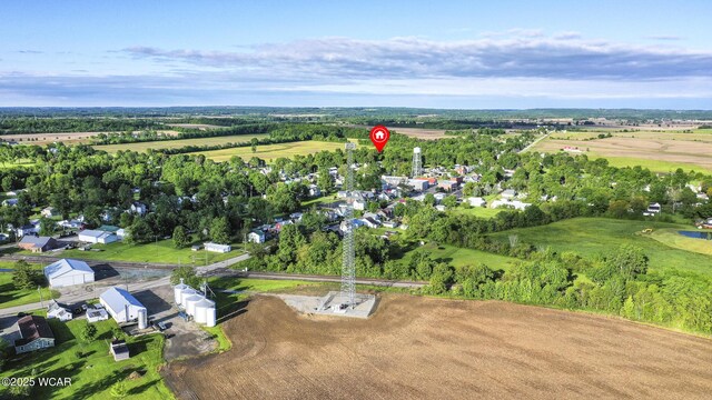 247 W State St, West Mansfield, OH 43358 - aerial overview of property's location featuring a tree filled landscape