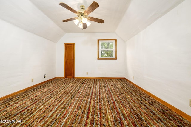 247 W State St, West Mansfield, OH 43358 - additional living space featuring lofted ceiling, a ceiling fan, baseboards, and carpet floors