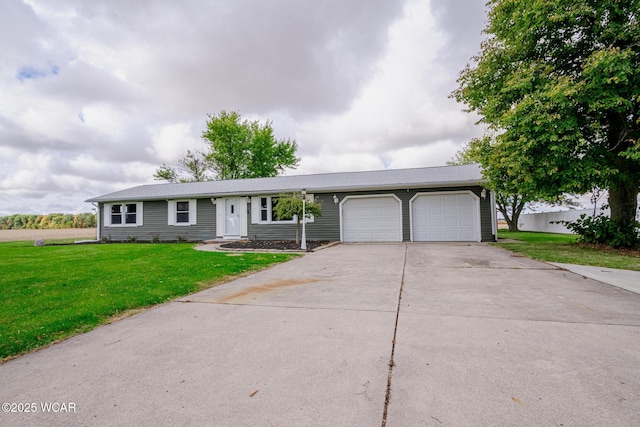 ranch-style home with a garage and a front lawn