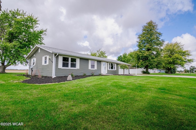 single story home with a front yard