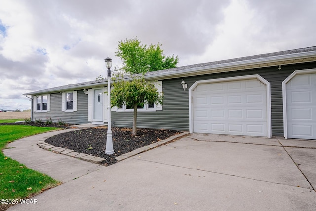 ranch-style home with a garage