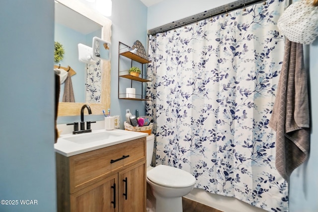2432 Kunneke Ave, Lima, OH 45805 - full bathroom featuring toilet, a shower with shower curtain, vanity, and wood finished floors
