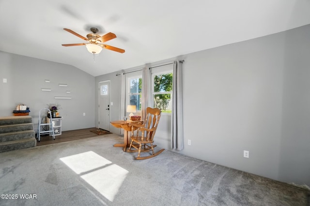 2432 Kunneke Ave, Lima, OH 45805 - living area with vaulted ceiling, a ceiling fan, carpet flooring, and stairs
