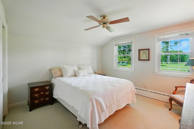 2297 June Dr, Lima, OH 45805 - bedroom featuring vaulted ceiling, a baseboard heating unit, ceiling fan, and carpet floors