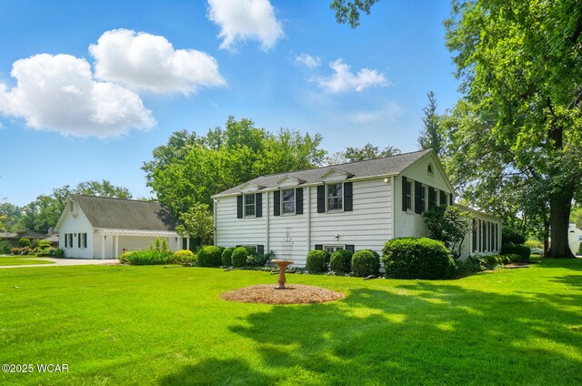 2297 June Dr, Lima, OH 45805 - view of home's exterior featuring a yard