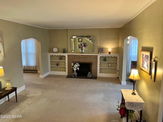 living room with a baseboard heating unit, a fireplace, ornamental molding, and carpet flooring