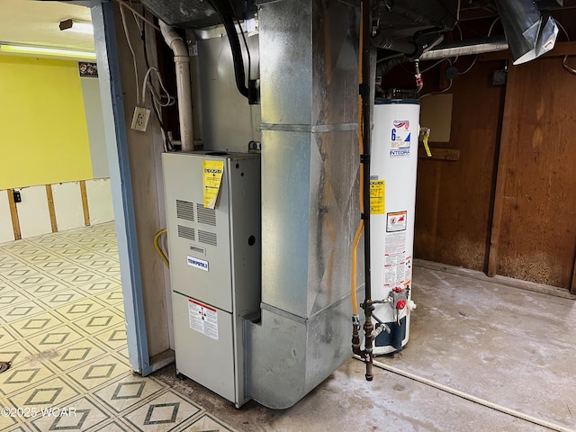 utility room with gas water heater and heating unit