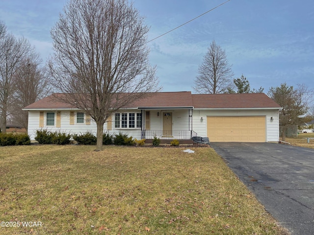 ranch-style house featuring an attached garage, a porch, a front lawn, and aphalt driveway