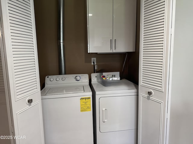 1821 Rice Ave, Lima, OH 45805 - laundry area featuring cabinet space and washer and clothes dryer