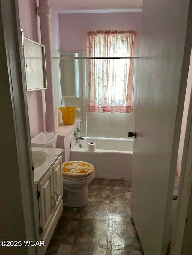 full bathroom with vanity, toilet, and washtub / shower combination