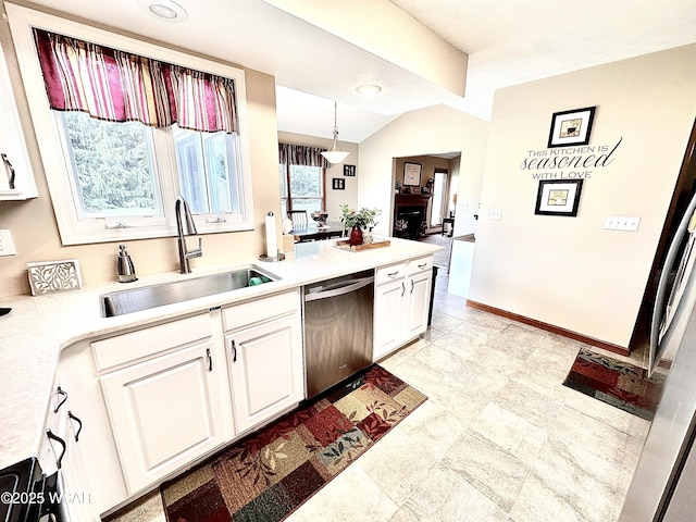4095 N Cole St, Lima, OH 45807 - kitchen with dishwasher, a sink, white cabinets, light countertops, and baseboards