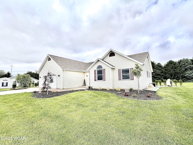 4095 N Cole St, Lima, OH 45807 - ranch-style house featuring a front yard, an attached garage, driveway, and a shingled roof