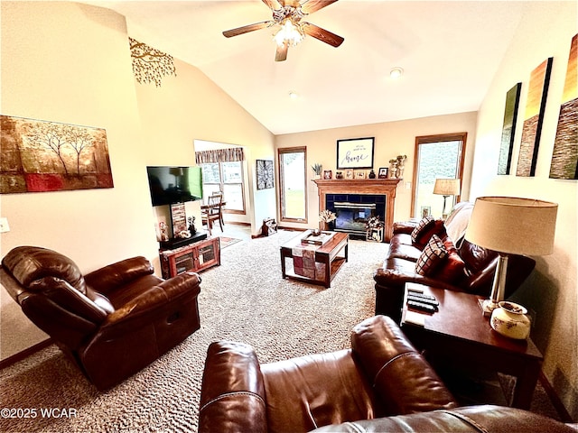 4095 N Cole St, Lima, OH 45807 - living area featuring carpet, lofted ceiling, a ceiling fan, a tiled fireplace, and baseboards