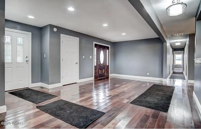 foyer entrance featuring hardwood / wood-style flooring