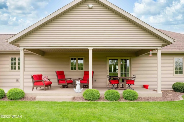 17210 State Route 694, Ottawa, OH 45875 - back of property featuring a shingled roof, a yard, and a patio area