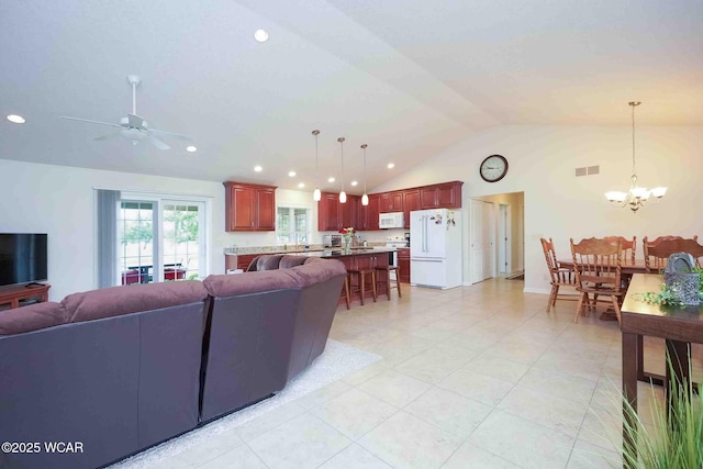 17210 State Route 694, Ottawa, OH 45875 - living area featuring lofted ceiling, a chandelier, a ceiling fan, recessed lighting, and light tile patterned flooring