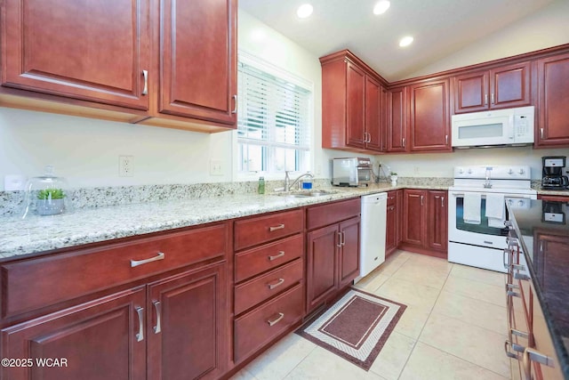 17210 State Route 694, Ottawa, OH 45875 - kitchen with white appliances, a sink, light stone countertops, vaulted ceiling, and recessed lighting