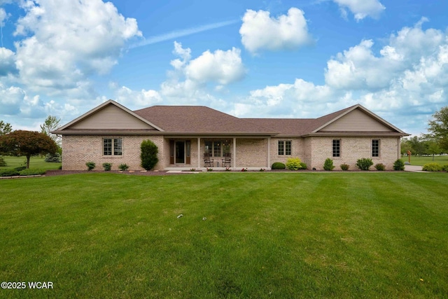 17210 State Route 694, Ottawa, OH 45875 - ranch-style home featuring brick siding, a front lawn, and a shingled roof