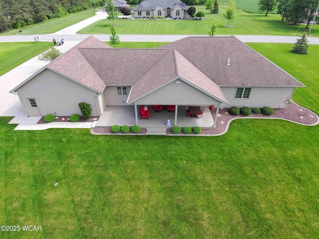 17210 State Route 694, Ottawa, OH 45875 - view of front facade featuring a patio area, a front lawn, and roof with shingles
