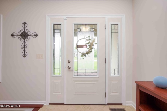 17210 State Route 694, Ottawa, OH 45875 - entryway featuring baseboards and light tile patterned flooring
