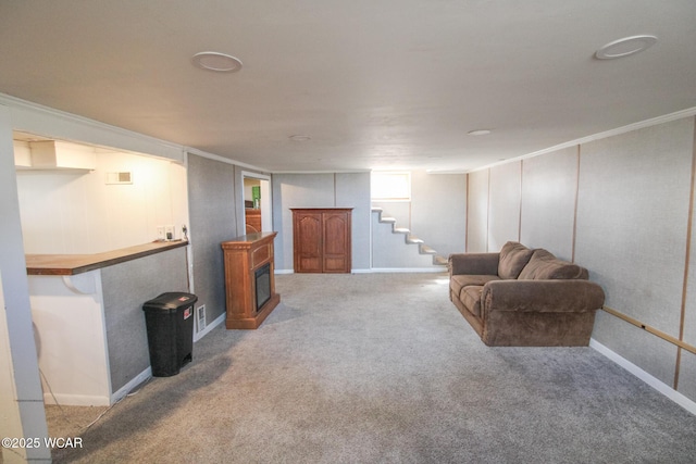 living room with baseboards, stairs, carpet, and ornamental molding