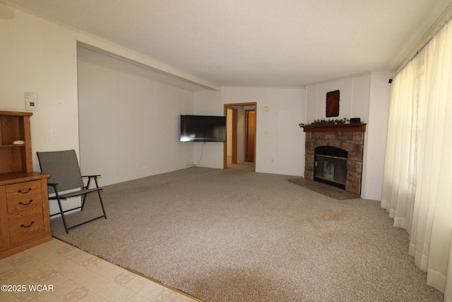 unfurnished living room with a brick fireplace and light carpet