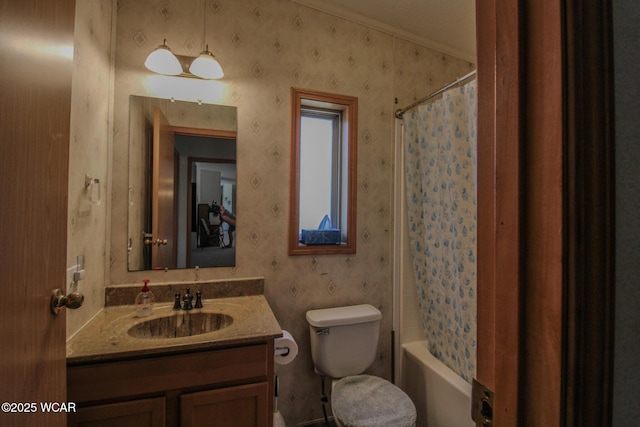 bathroom featuring toilet, shower / bath combination with curtain, vanity, and wallpapered walls