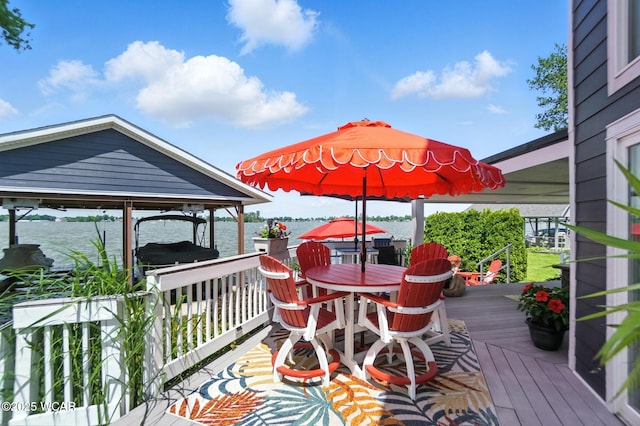 7407 Mingo Way, Russells Point, OH 43348 - wooden deck featuring boat lift and a water view