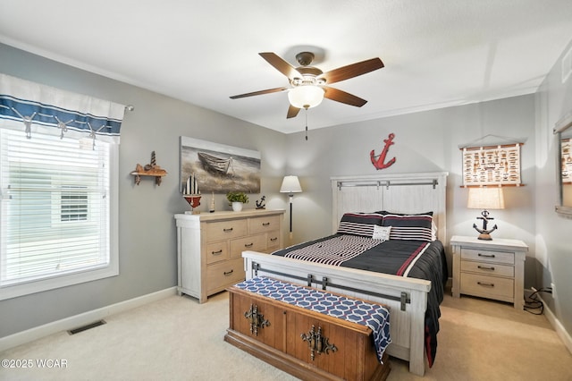 7407 Mingo Way, Russells Point, OH 43348 - bedroom with light carpet and a ceiling fan