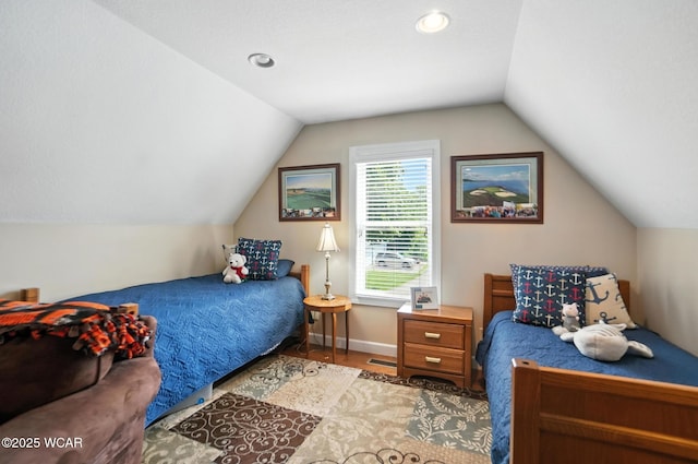 7407 Mingo Way, Russells Point, OH 43348 - bedroom with vaulted ceiling and baseboards