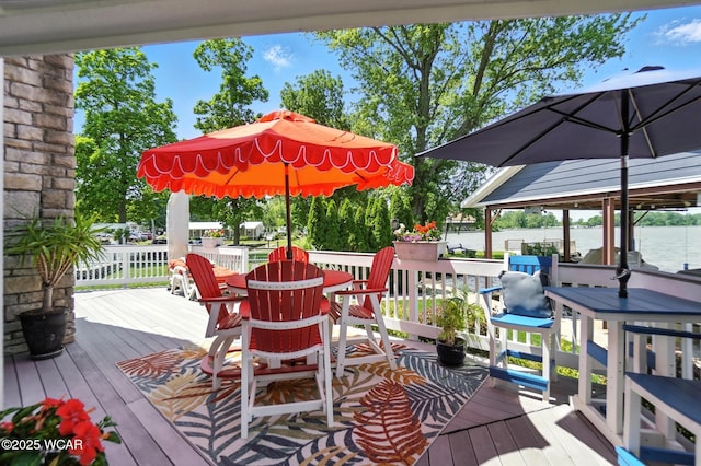 7407 Mingo Way, Russells Point, OH 43348 - wooden terrace with outdoor dining area