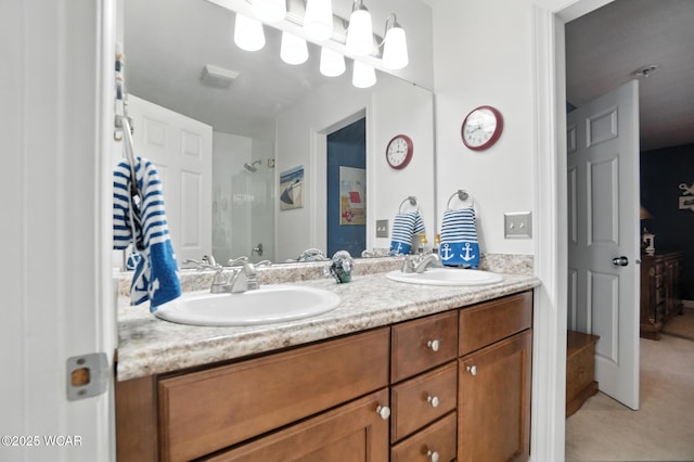 7407 Mingo Way, Russells Point, OH 43348 - full bathroom featuring double vanity and a shower with door