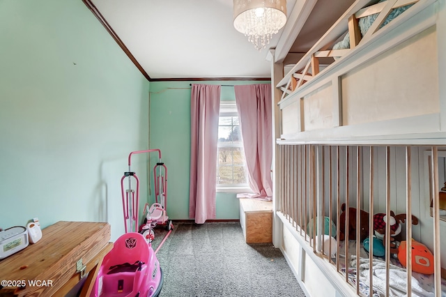 carpeted bedroom with crown molding and an inviting chandelier