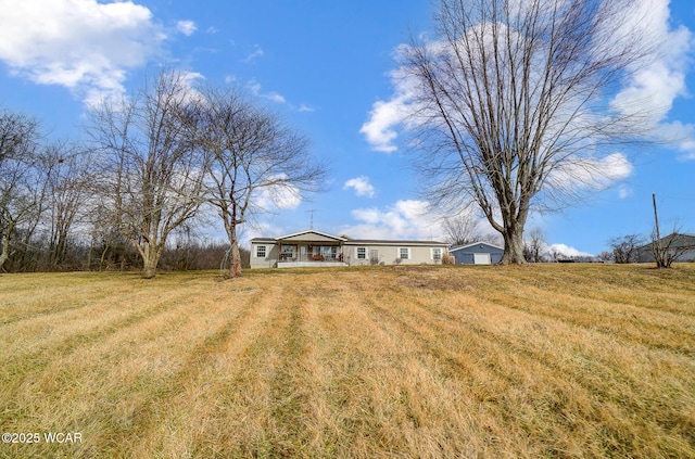 view of front facade with a front yard and a porch