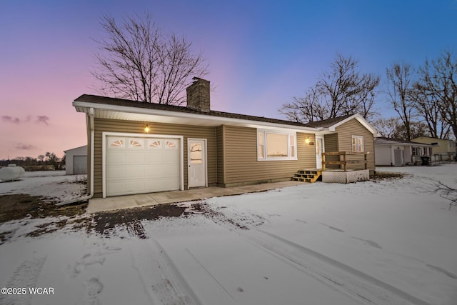 view of front of property featuring a garage