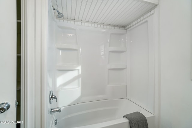 bathroom featuring washtub / shower combination