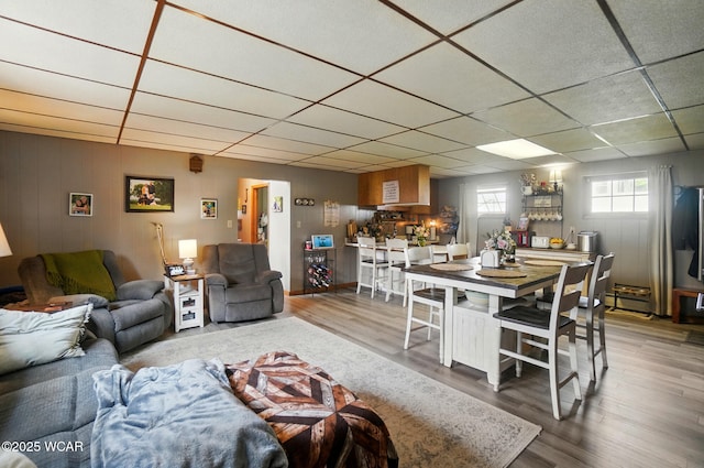 504 E 6th St, Delphos, OH 45833 - living room featuring a drop ceiling and wood finished floors