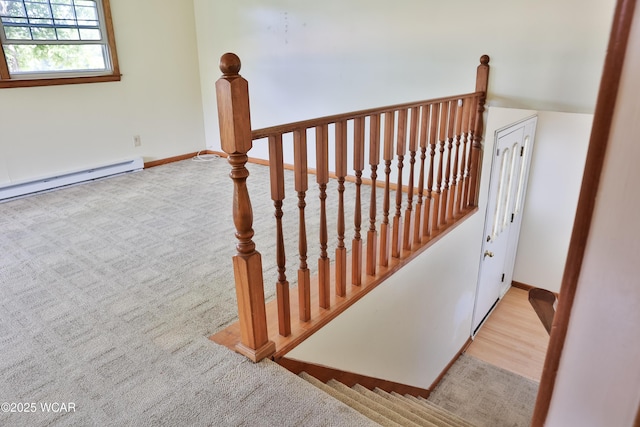 4940 Stewart Rd, Lima, OH 45801 - stairway with a baseboard radiator and baseboards