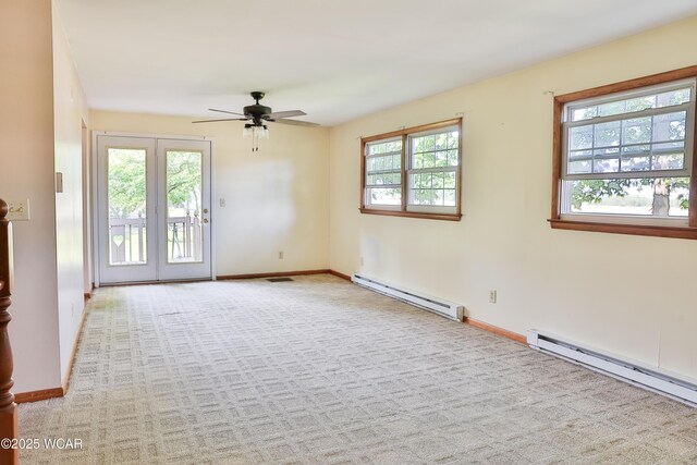 4940 Stewart Rd, Lima, OH 45801 - carpeted spare room with a baseboard radiator, ceiling fan, and baseboards