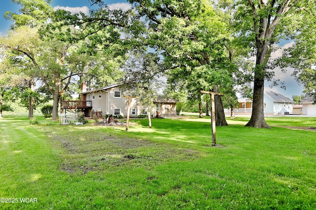 4940 Stewart Rd, Lima, OH 45801 - view of grassy yard featuring a wooden deck